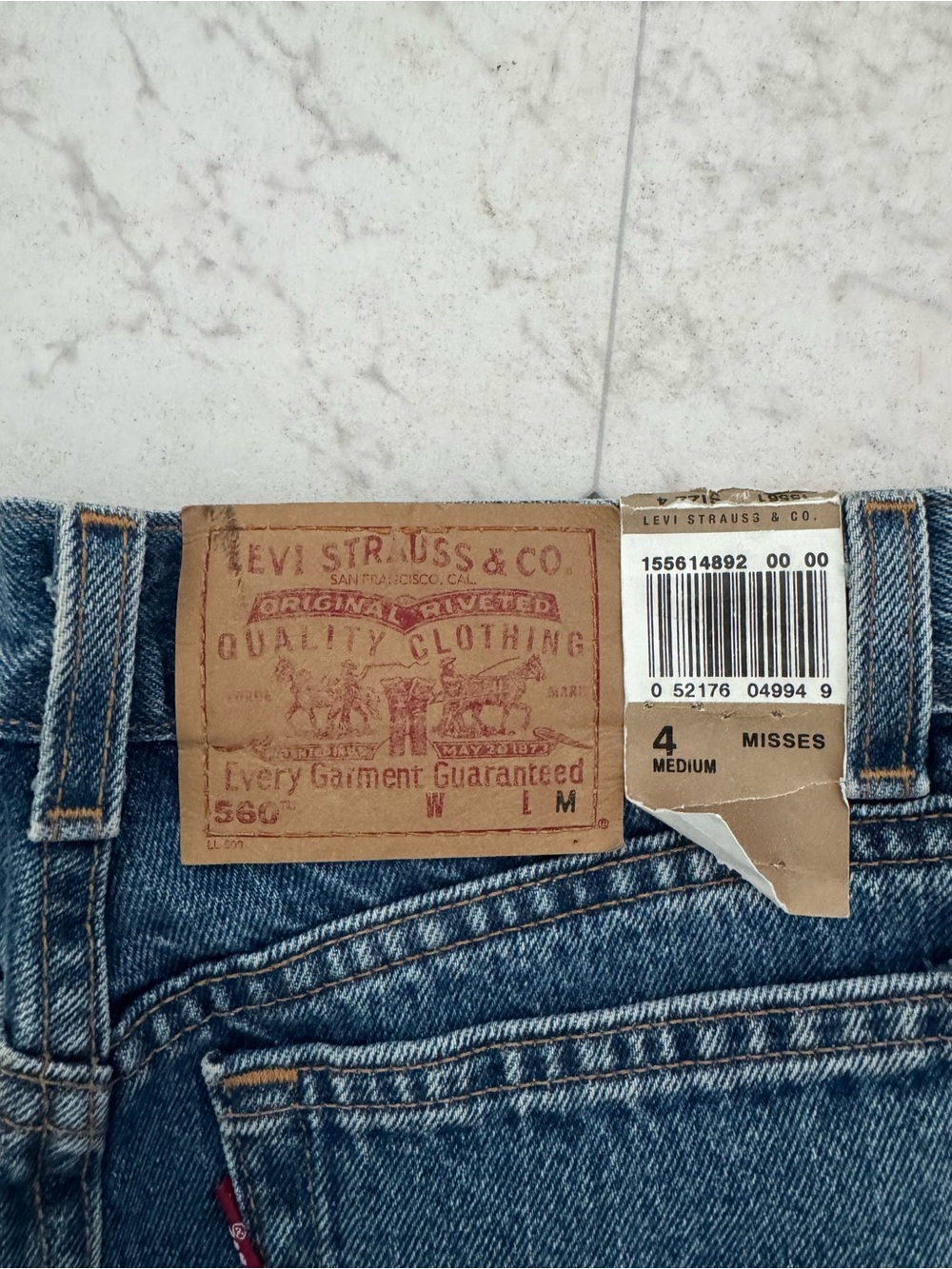 Levi's High-Rise Blue Denim Jeans with Leather Patch